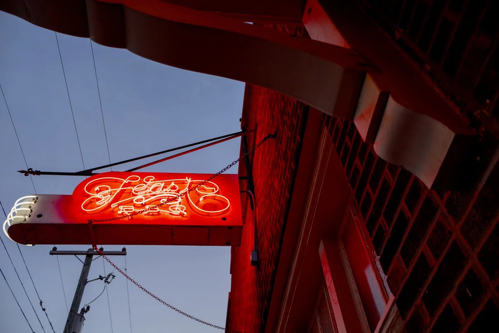 Neon sign at dusk